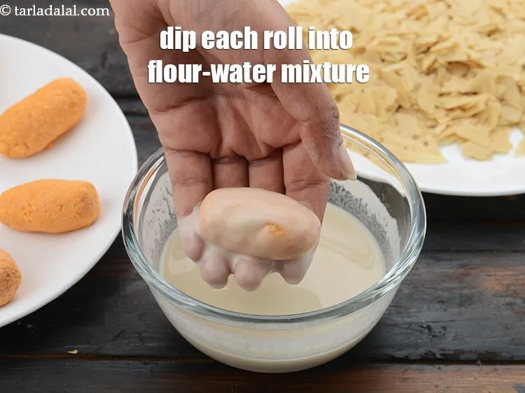 Step 16 – Dip each roll into the flour-water mixture.&nbsp;