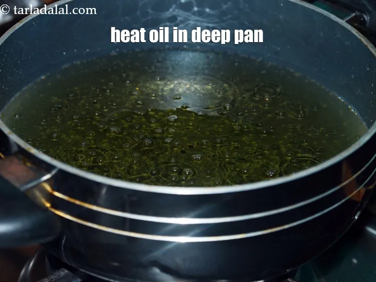 Step 16 – Heat the oil in a deep non-stick pan.