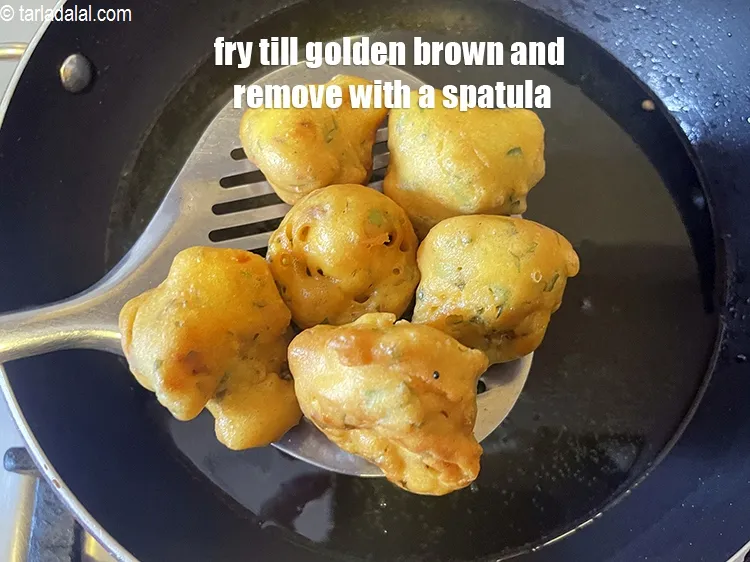 Step 16 – Fry till they turn golden brown in colour from all the sides and remove with …