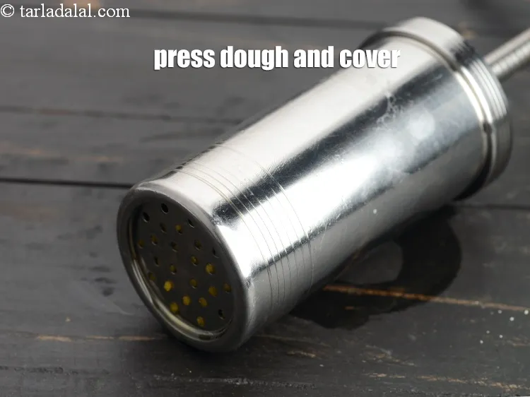 Step 17 – Press the dough into it and cover it with the lid.