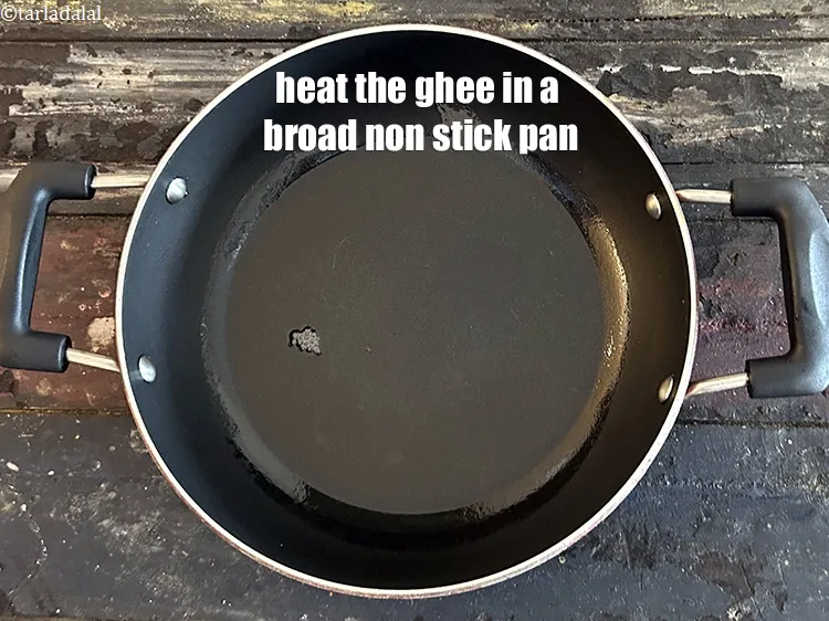 Step 16 – To prepare the stuffing for <strong>parathas stuffed with veggies and cheese</strong>, heat <meta charset="UTF-8" />2 …