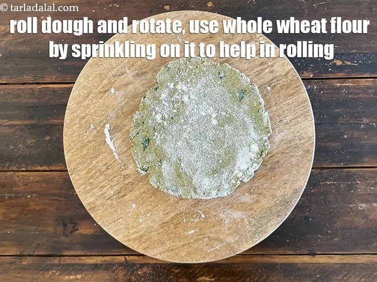 Step 22 – As you roll the dough, you will need to rotate it and sprinkle whole wheat …