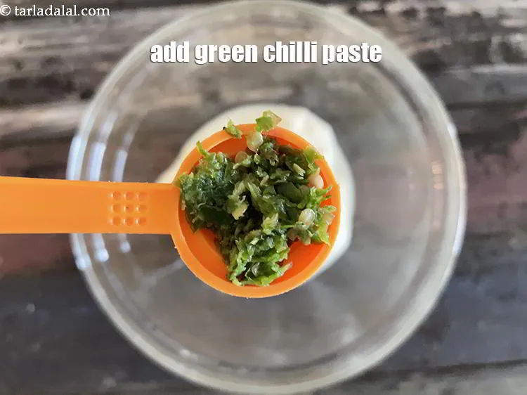 Step 18 – Add&nbsp;<meta charset="UTF-8" />1 1/2 tsp&nbsp;<a href="glossary-green-chilli-paste-hari-mirch-ki-paste-mirchi-paste-333i">green chilli paste</a>.