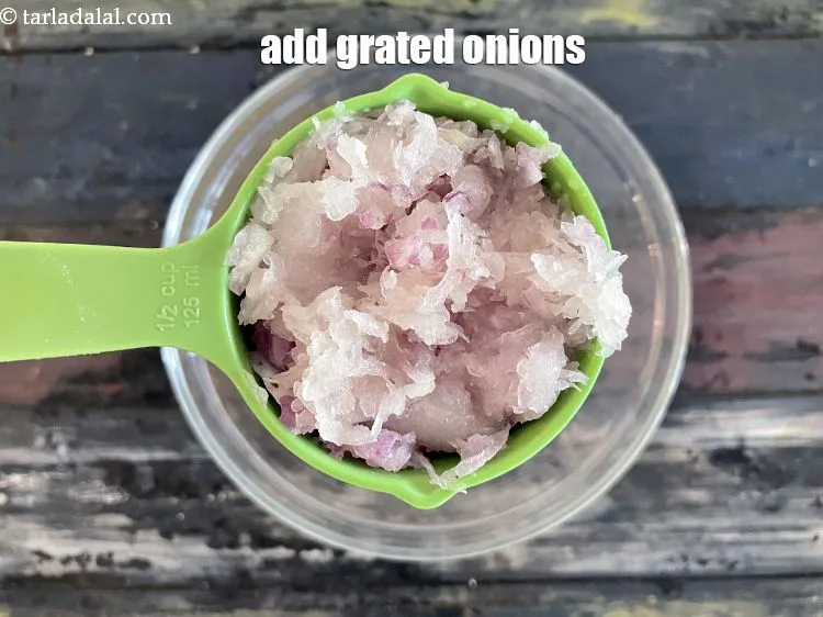 Step 8 – Add&nbsp;<meta charset="UTF-8" />1/2 cup&nbsp;<a href="glossary-grated-onions-999i">grated onions</a>.