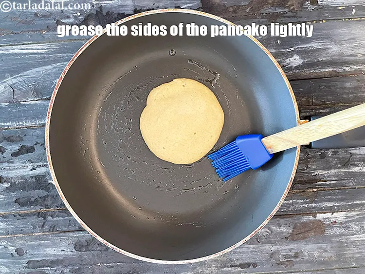 Step 21 – Grease the sides of the pancake lightly.