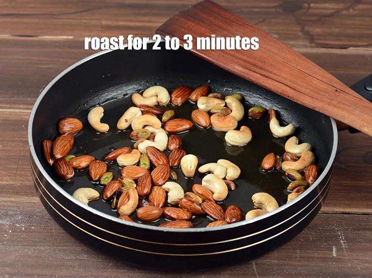 Step 16 – Roast on a medium flame for 2 to 3 minutes until they are slightly browned.