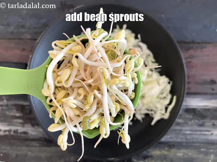 Step 18 – Add&nbsp;<meta charset="UTF-8" />1/2 cup&nbsp;<a href="bean-sprouts-1324r">bean sprouts</a>.
