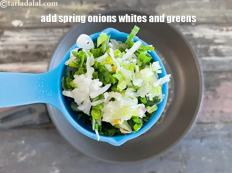 Step 15 – Add&nbsp;<meta charset="UTF-8" />1/2 cup&nbsp;finely&nbsp;<a href="glossary-chopped-spring-onions-1575i">chopped spring onions</a>&nbsp;(whites and greens).