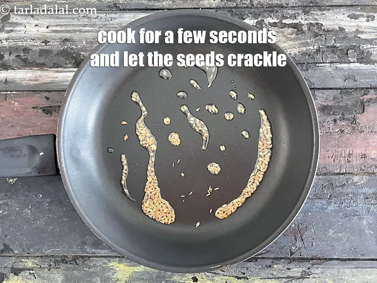 Step 18 – Cook for a few seconds and let the seeds crackle.