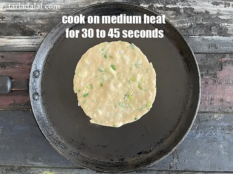 Step 19 – <meta charset="UTF-8" /> Cook &nbsp;on &nbsp;hot non-stick tava (griddle) &nbsp;on medium heat for 30 to …