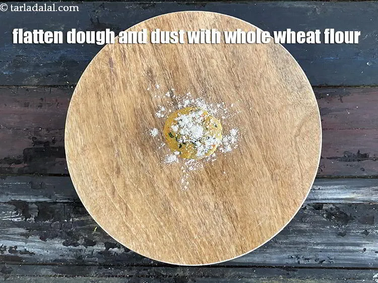 Step 16 – Flatten dough and put some whole wheat flour on it.