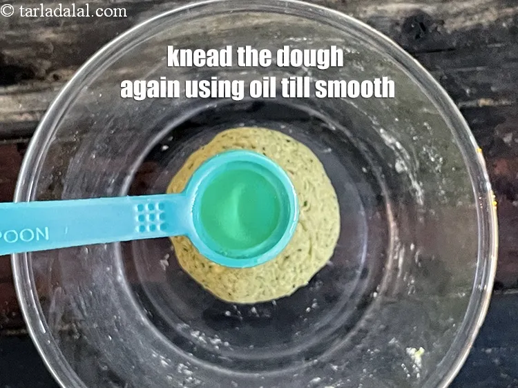 Step 16 – <meta charset="UTF-8" />Knead the dough well using oil till smooth.