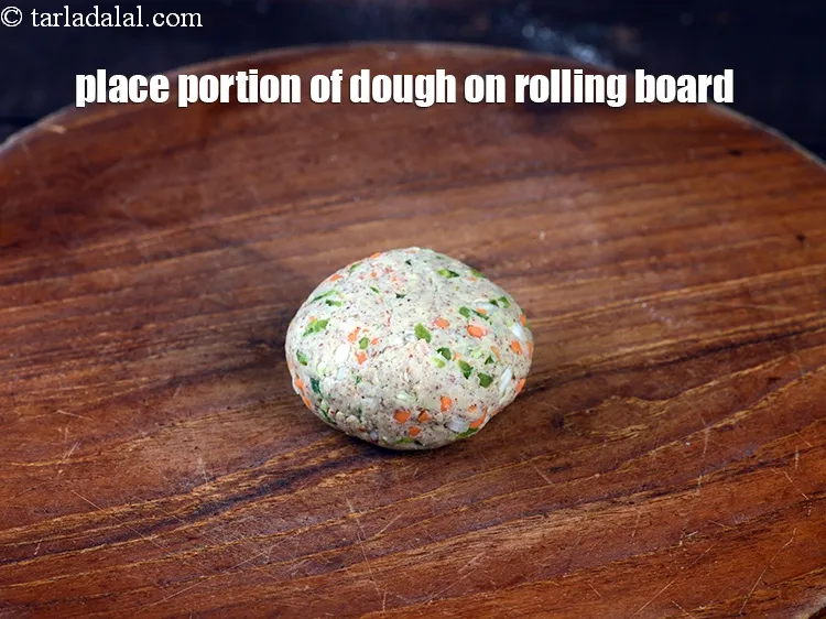 Step 16 – Place a portion of dough on a rolling board.