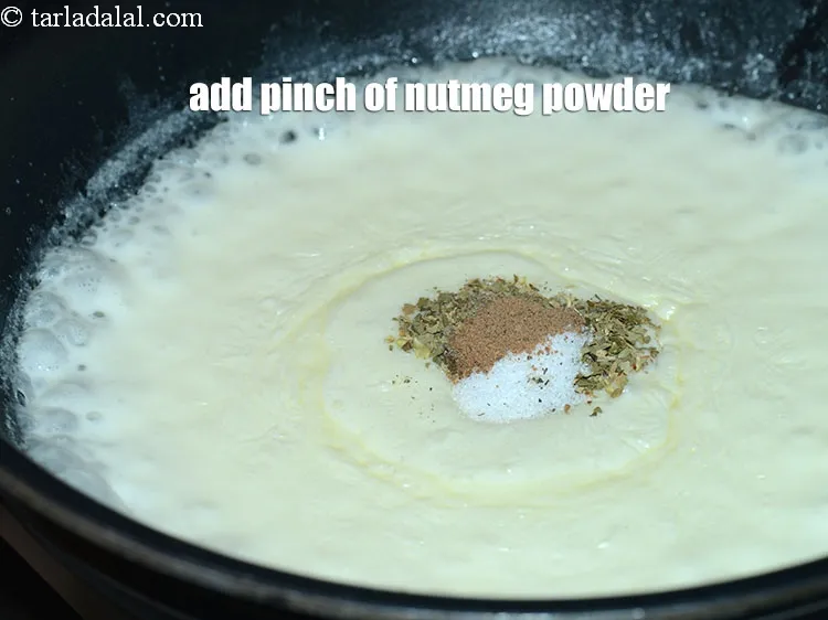 Step 18 – Add a pinch of <a href="https://www.tarladalal.com/glossary-nutmeg-powder-jaiphal-powder-543i">nutmeg (jaiphal) powder</a>.