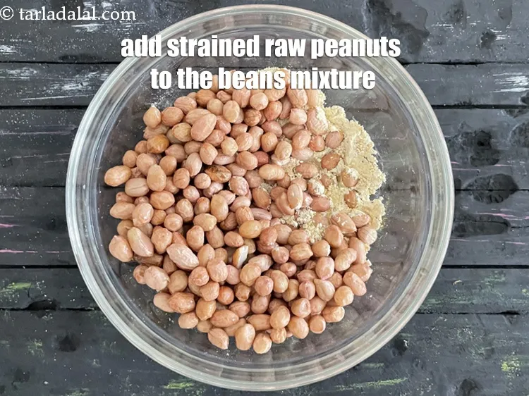 Step 17 – Add the strained peanuts to the besan mixture.