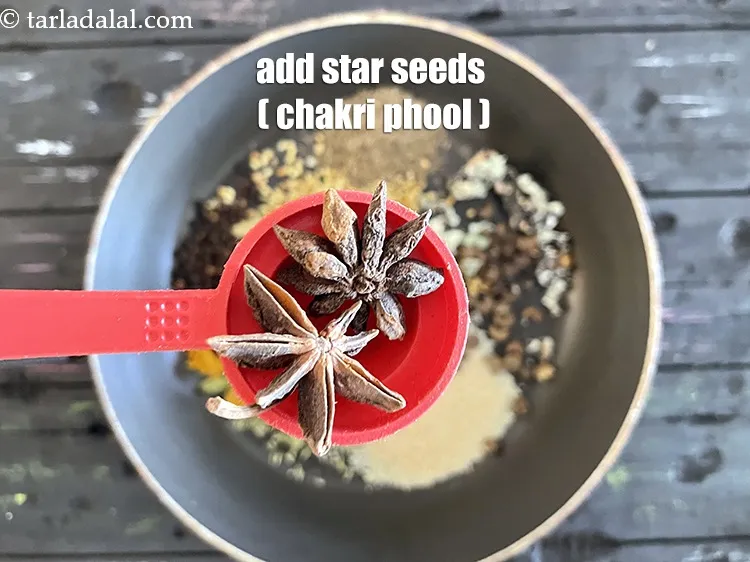 Step 16 – Add&nbsp;<meta charset="UTF-8" />2&nbsp;small&nbsp;<a href="glossary-star-anise-chakri-phool-623i">star anise (chakri phool)</a>.