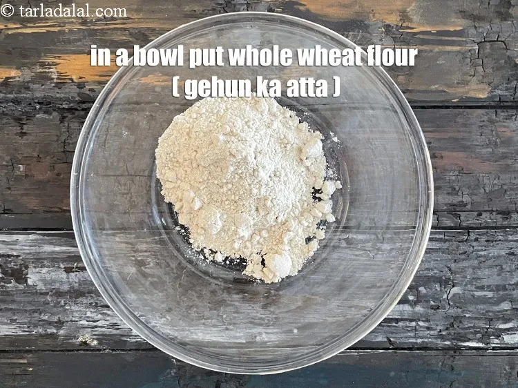 Step 16 – In a bowl put&nbsp;<meta charset="UTF-8" /><strong>1/2&nbsp;cup</strong>&nbsp;<a href="glossary-whole-wheat-flour-gehun-ka-atta-gehun-ka-aata-429i">whole wheat flour (gehun ka atta)</a>.