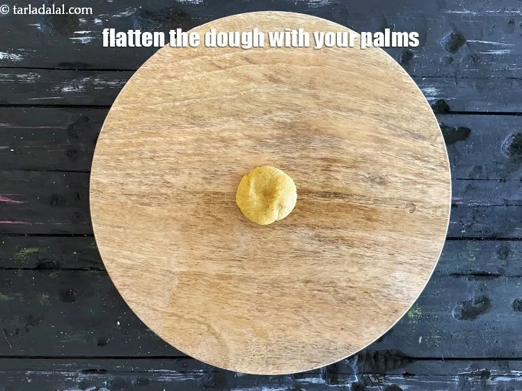 Step 17 – Flatten the dough with your palms.