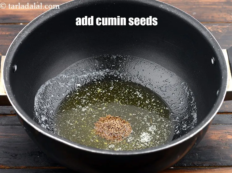 Step 17 – Add 1 tsp&nbsp;<a href="https://www.tarladalal.com/glossary-cumin-seeds-jeera-zeera-381i">cumin seeds (jeera)</a>.