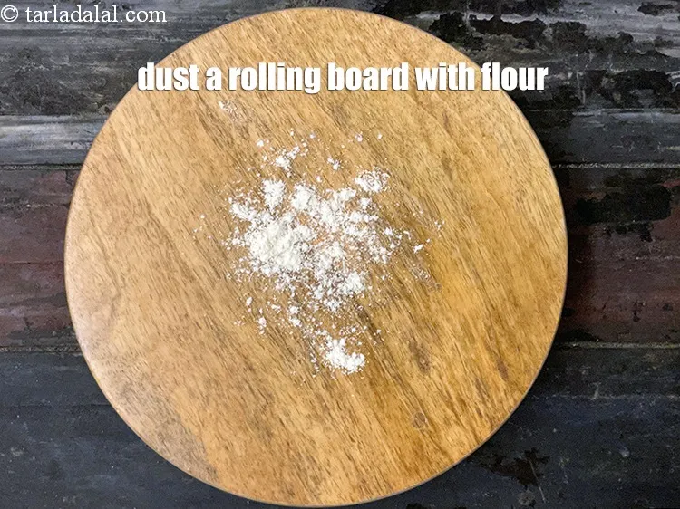 Step 17 – Dust the rolling board with a little flour.