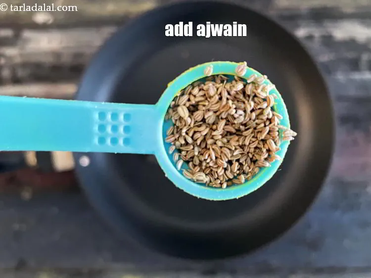 Step 16 – Add&nbsp;1/2 tsp&nbsp;<a href="glossary-carom-seeds-ajwain-thymol-seeds-bishops-weed-266i">carom seeds (ajwain)</a>.