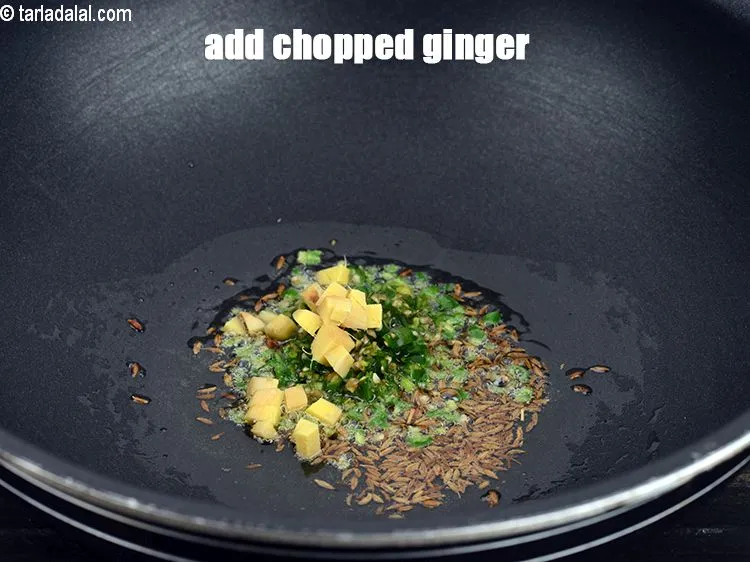 Step 16 – Add 1 tsp <a href="https://www.tarladalal.com/glossary-chopped-ginger-786i">chopped ginger (adrak)</a>.
