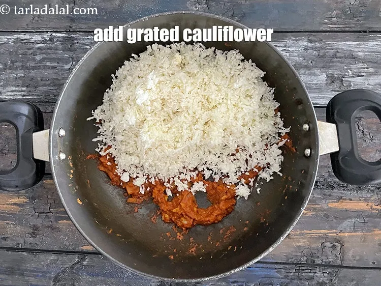 Step 19 – Add&nbsp;<meta charset="UTF-8" />2 cups&nbsp;<a href="glossary-grated-cauliflower-994i">grated cauliflower</a>.