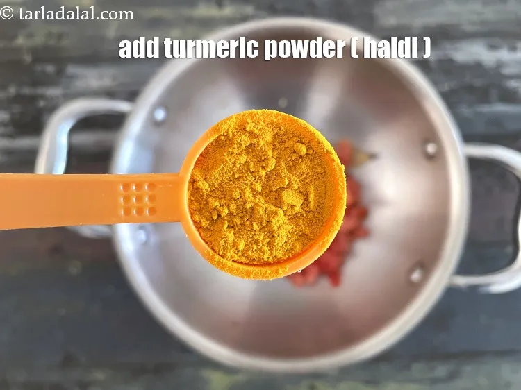 Step 24 – Add&nbsp;<meta charset="UTF-8" />1 tsp&nbsp;<a href="glossary-turmeric-powder-haldi-645i">turmeric powder (haldi)</a>.