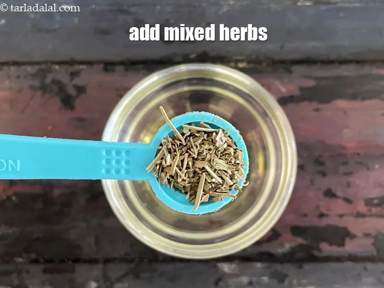 Step 12 – Add&nbsp;1/2 tsp&nbsp;<a href="glossary-dried-mixed-herbs-466i">dried mixed herbs</a>.
