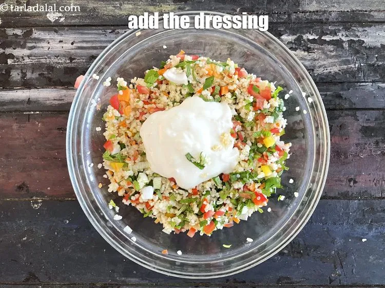 Step 24 – Add the curd garlic dressing. Look above for how to make the dressing.