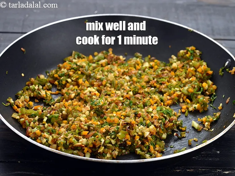 Step 16 – Mix well and cook on a medium flame for 1 minute.