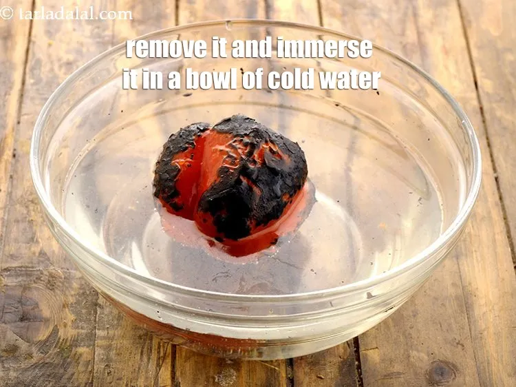Step 17 – Remove it from the flame and immerse it in a bowl of cold water.