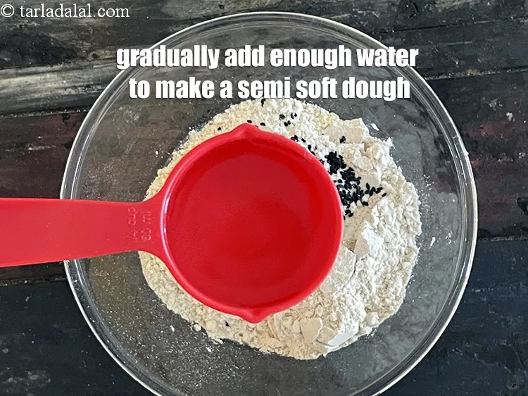 Step 16 – Add enough water to make a semi soft dough. We gradually added 1/2&nbsp;cup of water …
