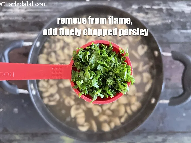 Step 30 – Remove from flame, add <meta charset="UTF-8" />2 tbsp&nbsp;freshly&nbsp;<a href="glossary-chopped-parsley-793i">chopped parsley</a>.