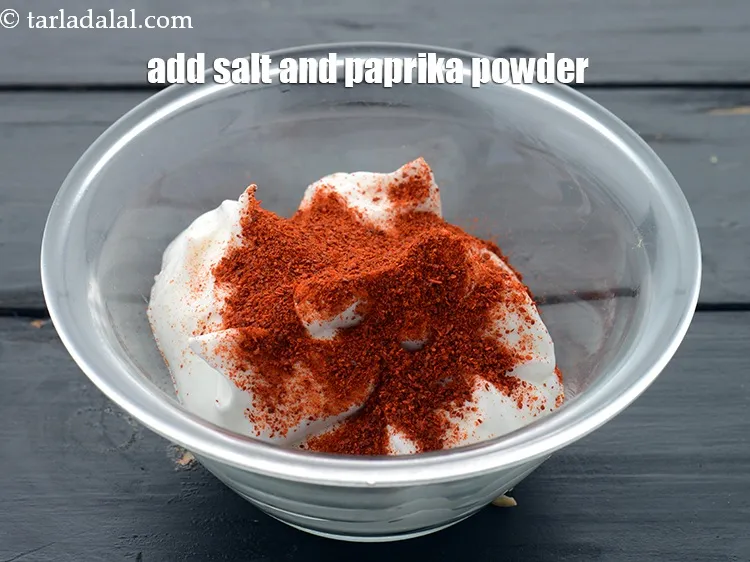 Step 16 – Add <a href="https://www.tarladalal.com/glossary-salt-namak-table-salt-418i">salt</a>&nbsp;to taste and&nbsp;1 tbsp paprika powder.&nbsp;