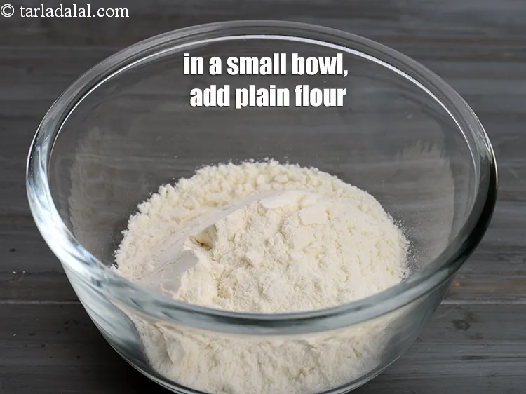 Step 16 – To make plain flour-water mixture, in a small bowl, add 1/4 cup plain flour.