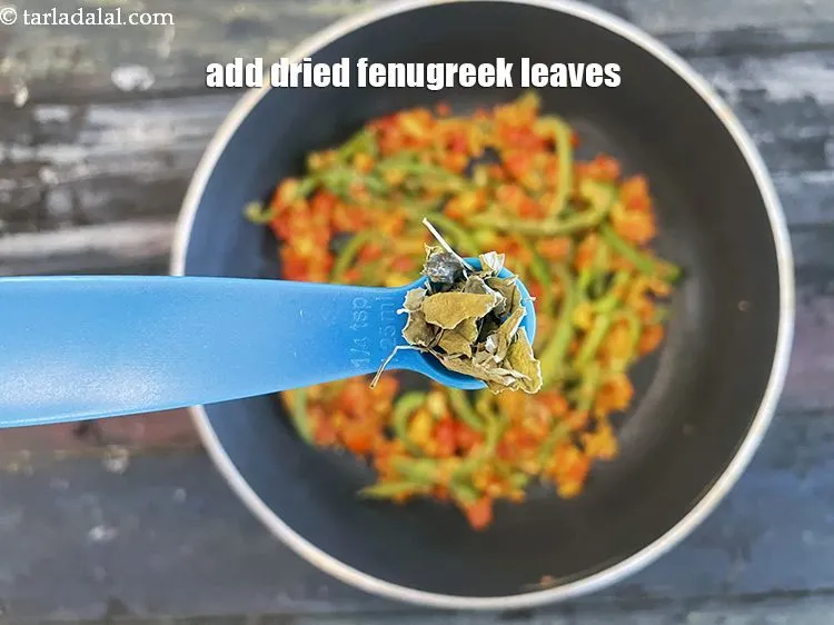 Step 23 – Add&nbsp;<meta charset="UTF-8" />1/4 tsp&nbsp;<a href="glossary-dried-fenugreek-leaves-kasuri-methi-374i">dried fenugreek leaves (kasuri methi)</a>.