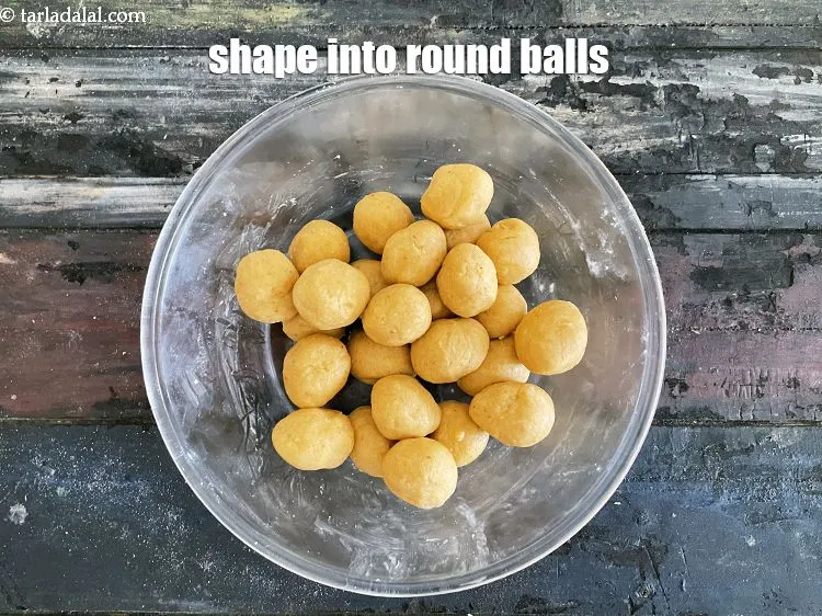 Step 20 – Shape the dough into round balls.<em> We will be rolling into 4.5 inches cylinder shaped …