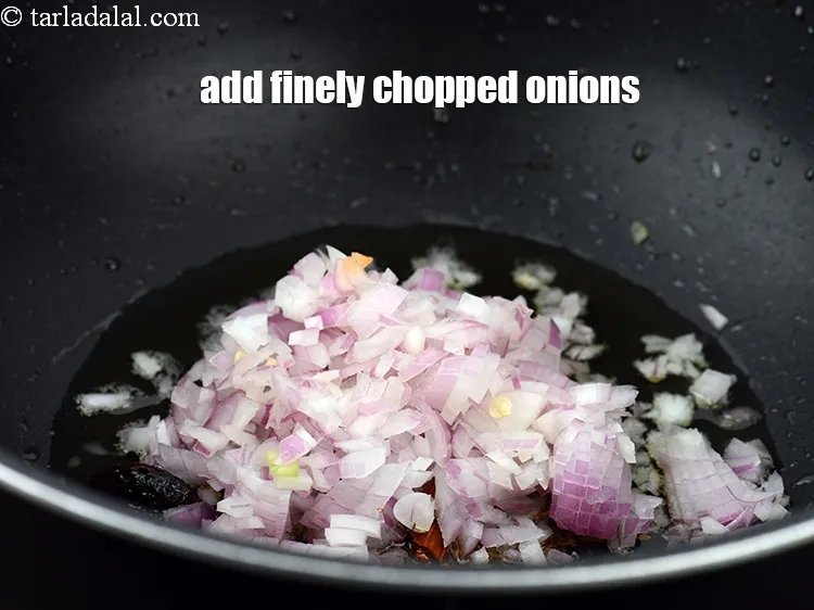 Step 17 – Add &frac12; cup finely&nbsp;<a href="https://www.tarladalal.com/glossary-chopped-onions-722i">chopped onions</a>.
