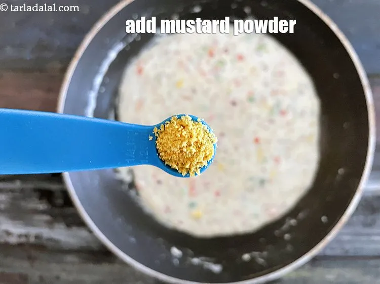 Step 23 – Add&nbsp;1/4 tsp&nbsp;<a href="glossary-mustard-powder-rai-powder-sarson-powder-powdered-sarson-526i">mustard (rai / sarson) powder</a>.