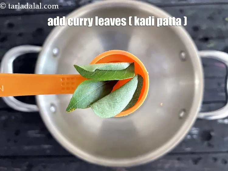 Step 16 – Add&nbsp;<meta charset="UTF-8" />3&nbsp;<a href="glossary-curry-leaves-kadi-patta-kadipatta-388i">curry leaves (kadi patta)</a>.