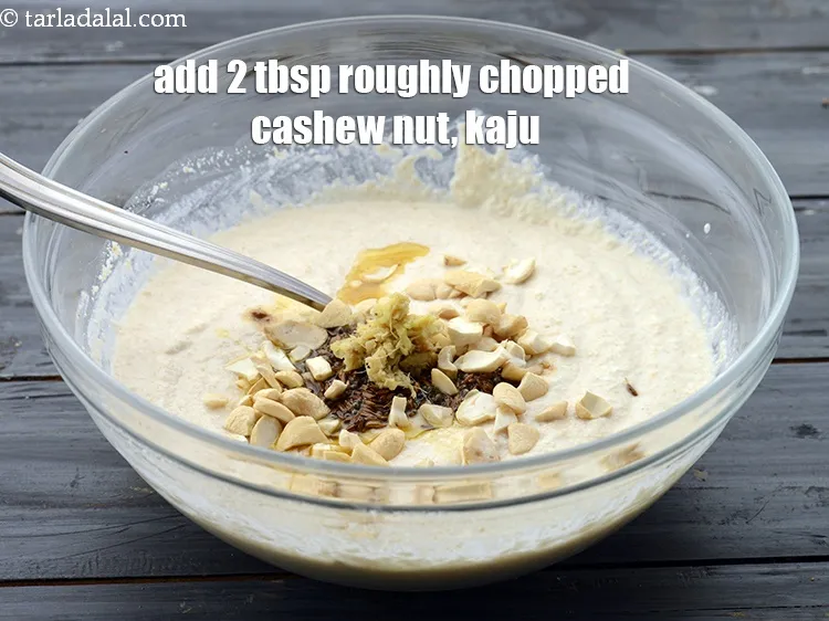 Step 25 – Add 2 tbsp&nbsp;roughly&nbsp;<a href="https://www.tarladalal.com/glossary-chopped-cashew-nut-791i">chopped cashew nut (kaju)</a>.
