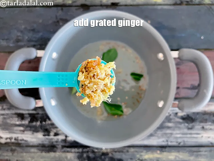 Step 20 – Add&nbsp;<meta charset="UTF-8" />1/2 tsp&nbsp;<a href="glossary-grated-ginger-943i">grated ginger (adrak)</a>.