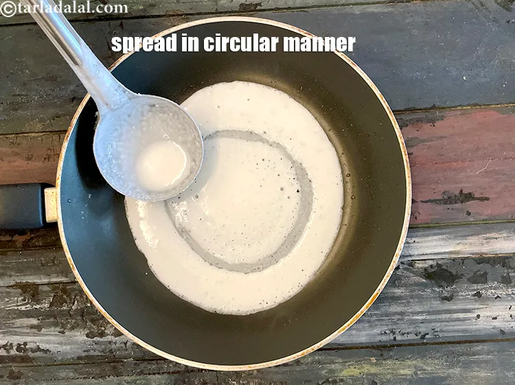 Step 18 – Spread batter in circular manner of 6 to 7 inches diameter.&nbsp;