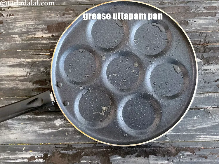 Step 28 – We will be using the same batter from mini rava uttapam. Now&nbsp;grease a non-stick mini …