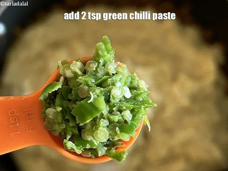 Step 23 – Add&nbsp;<meta charset="UTF-8" />2 tsp&nbsp;<a href="glossary-green-chilli-paste-hari-mirch-ki-paste-mirchi-paste-333i">green chilli paste</a>.