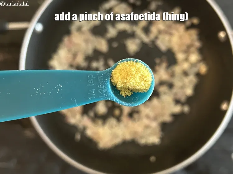 Step 18 – Add&nbsp;<meta charset="UTF-8" />a pinch of&nbsp;<a href="glossary-asafoetida-hing-113i">asafoetida (hing)</a>.