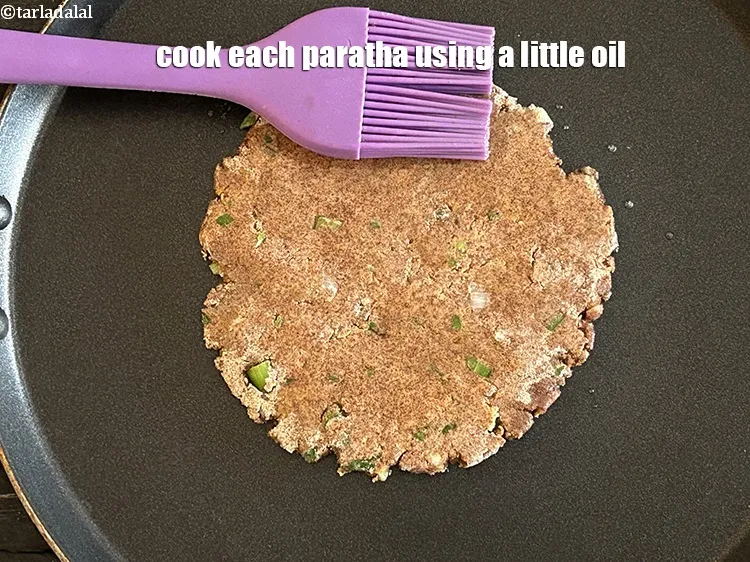 Step 16 – Cook each paratha using a little oil.