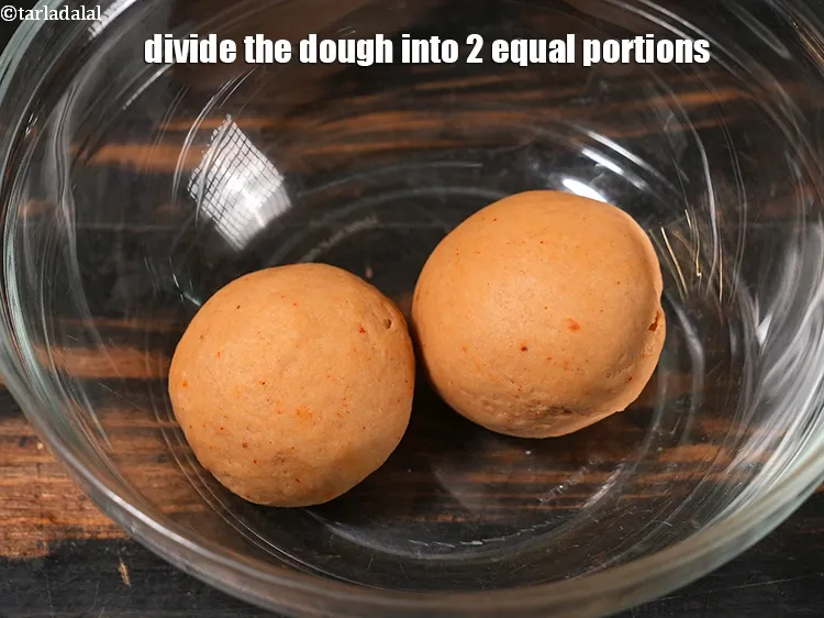 Step 18 – <p>Divide the dough into 2&nbsp;equal portions.</p>
