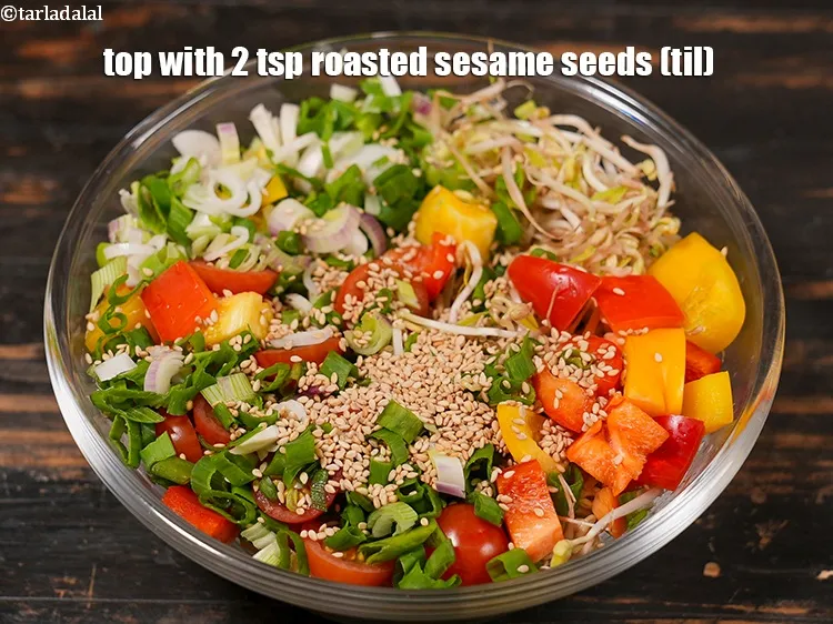 Step 17 – Top with&nbsp;<meta charset="UTF-8" />2 tsp&nbsp;<a href="glossary-roasted-sesame-seeds-2271i">roasted sesame seeds (til)</a>.